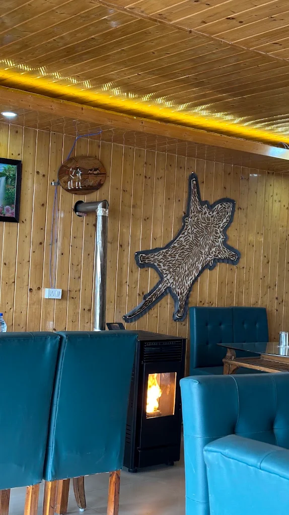 Dining at Munshi's restaurant, Tangmarg